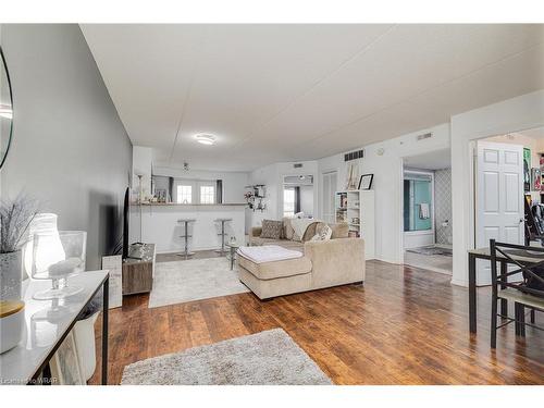 305-1390 Main Street E, Milton, ON - Indoor Photo Showing Living Room