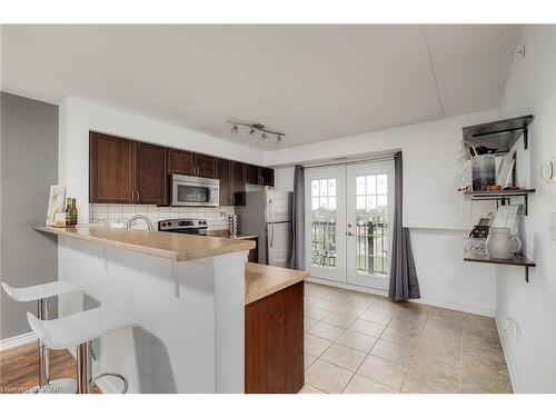 305-1390 Main Street E, Milton, ON - Indoor Photo Showing Kitchen