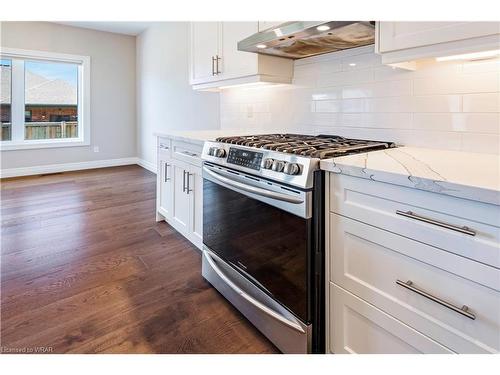 23 Carriage Crossing Crossing, Drayton, ON - Indoor Photo Showing Kitchen With Upgraded Kitchen