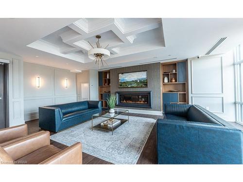 317-450 Dundas Street, Waterdown, ON - Indoor Photo Showing Living Room With Fireplace