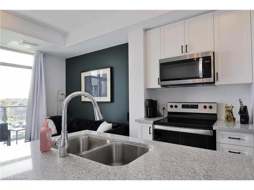 317-450 Dundas Street, Waterdown, ON - Indoor Photo Showing Kitchen With Stainless Steel Kitchen With Double Sink