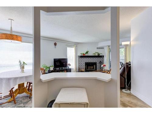 26-3085 Kingsway Drive, Kitchener, ON - Indoor With Fireplace