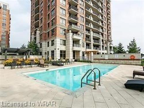 1002-2379 Central Park Drive, Oakville, ON - Outdoor With In Ground Pool