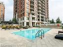 1002-2379 Central Park Drive, Oakville, ON  - Outdoor With In Ground Pool 