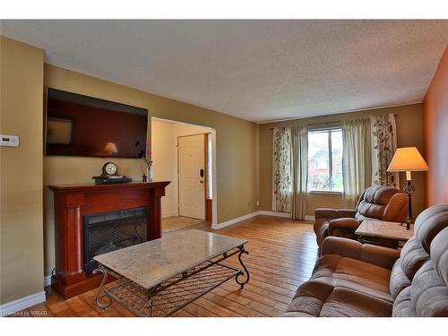 75 Stonehenge Place, Kitchener, ON - Indoor Photo Showing Living Room With Fireplace