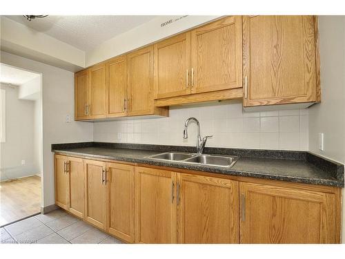 207-10 Cooper Street, Cambridge, ON - Indoor Photo Showing Kitchen With Double Sink