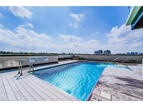 10-606-181 King Street S, Waterloo, ON - Outdoor With In Ground Pool With Deck Patio Veranda