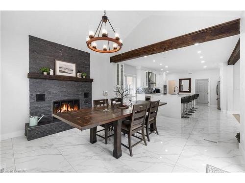 15 Pioneer Ridge Drive, Kitchener, ON - Indoor Photo Showing Dining Room With Fireplace