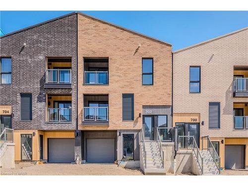 C019-702 Benninger Drive, Kitchener, ON - Outdoor With Balcony With Facade