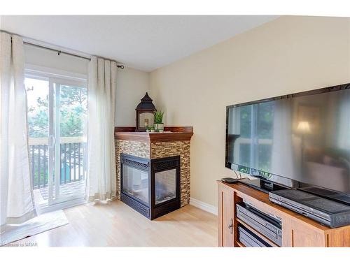 14-2651 Aquitaine Avenue, Mississauga, ON - Indoor Photo Showing Living Room With Fireplace