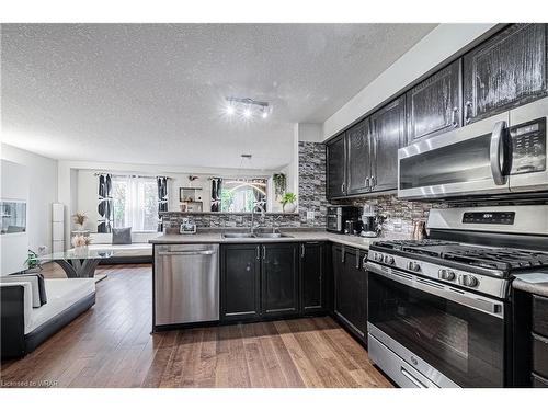 479 Trembling Aspen Avenue, Waterloo, ON - Indoor Photo Showing Kitchen With Stainless Steel Kitchen With Double Sink