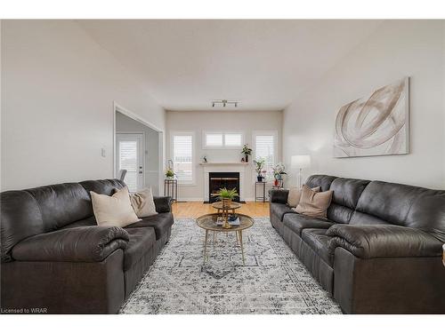 4-545 Laurelwood Drive, Waterloo, ON - Indoor Photo Showing Living Room With Fireplace