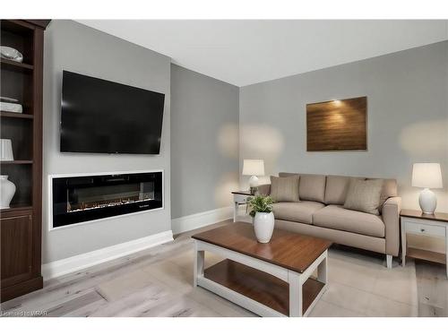 7 Crombie Street, Cambridge, ON - Indoor Photo Showing Living Room With Fireplace