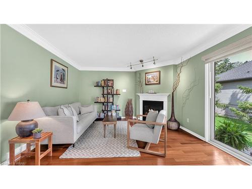 37-1499 Byron Baseline Road, London, ON - Indoor Photo Showing Living Room With Fireplace