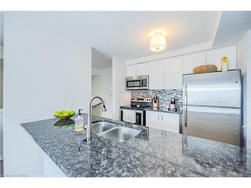 E-235 Rachel Crescent, Kitchener, ON - Indoor Photo Showing Kitchen With Stainless Steel Kitchen With Double Sink With Upgraded Kitchen