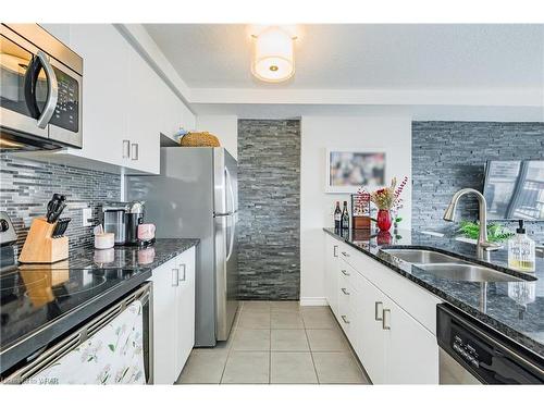 E-235 Rachel Crescent, Kitchener, ON - Indoor Photo Showing Kitchen With Stainless Steel Kitchen With Double Sink With Upgraded Kitchen