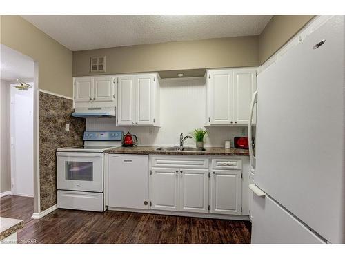 102-260 Sheldon Avenue N, Kitchener, ON - Indoor Photo Showing Kitchen With Double Sink