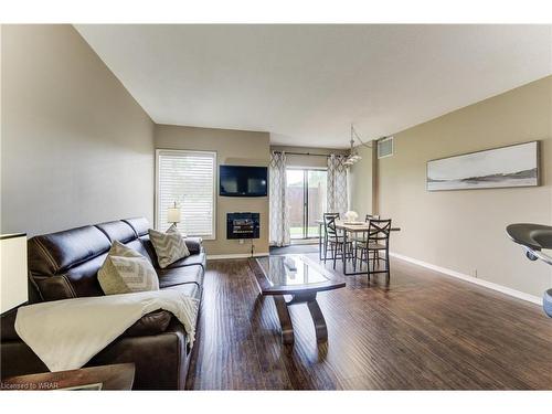 102-260 Sheldon Avenue N, Kitchener, ON - Indoor Photo Showing Living Room With Fireplace