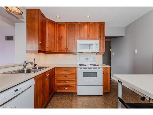 1105-150 Queen Boulevard, Kitchener, ON - Indoor Photo Showing Kitchen With Double Sink