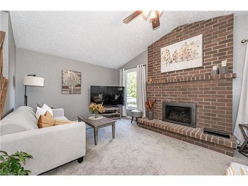 10 Pipers Green Court, Kitchener, ON - Indoor Photo Showing Living Room With Fireplace