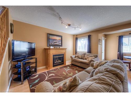 4 Schueller Street, Kitchener, ON - Indoor Photo Showing Other Room With Fireplace