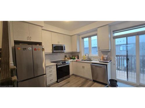 49-461 Blackburn Drive, Brantford, ON - Indoor Photo Showing Kitchen With Double Sink