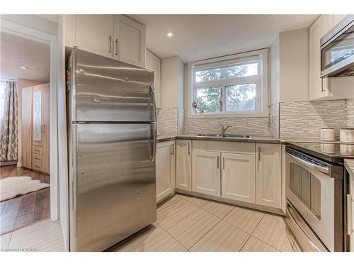 A-489 East Avenue, Kitchener, ON - Indoor Photo Showing Kitchen With Double Sink