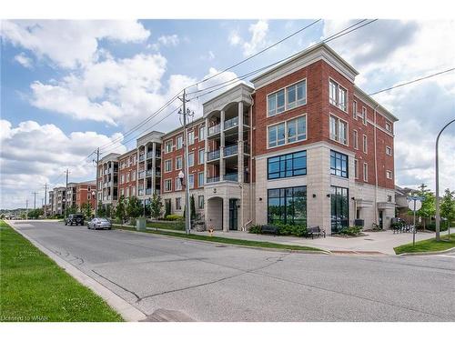 210-175 Commonwealth Street, Kitchener, ON - Outdoor With Balcony With Facade