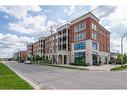 210-175 Commonwealth Street, Kitchener, ON  - Outdoor With Balcony With Facade 