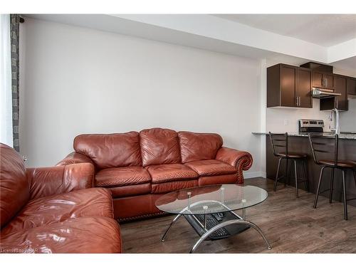 210-175 Commonwealth Street, Kitchener, ON - Indoor Photo Showing Living Room