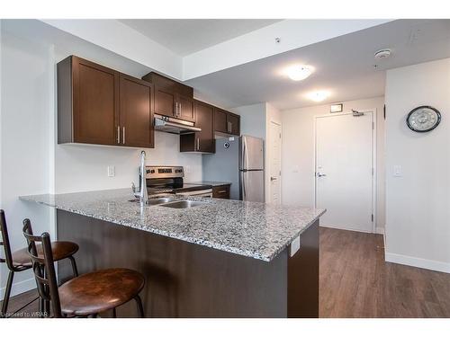 210-175 Commonwealth Street, Kitchener, ON - Indoor Photo Showing Kitchen With Double Sink With Upgraded Kitchen