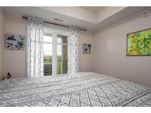 210-175 Commonwealth Street, Kitchener, ON - Indoor Photo Showing Bedroom