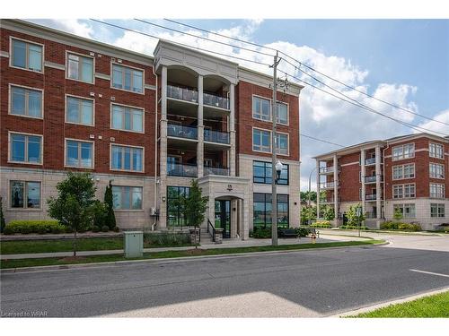 210-175 Commonwealth Street, Kitchener, ON - Outdoor With Balcony With Facade