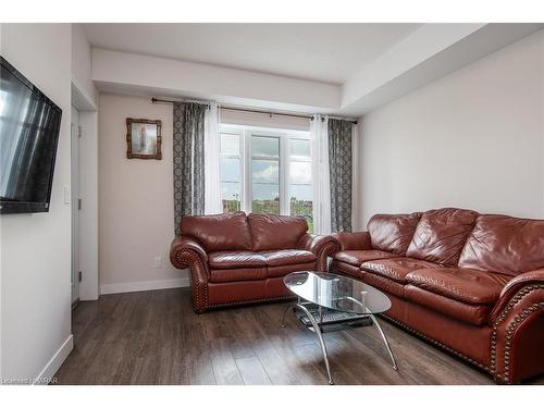 210-175 Commonwealth Street, Kitchener, ON - Indoor Photo Showing Living Room