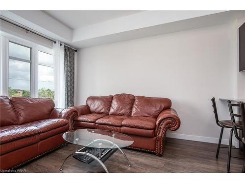 210-175 Commonwealth Street, Kitchener, ON - Indoor Photo Showing Living Room