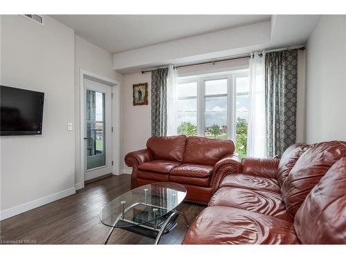 210-175 Commonwealth Street, Kitchener, ON - Indoor Photo Showing Living Room