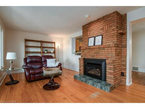 34 Moore Avenue N, Waterloo, ON - Indoor Photo Showing Living Room With Fireplace