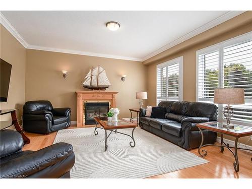 19 Winding Wood Crescent, Kitchener, ON - Indoor Photo Showing Living Room With Fireplace