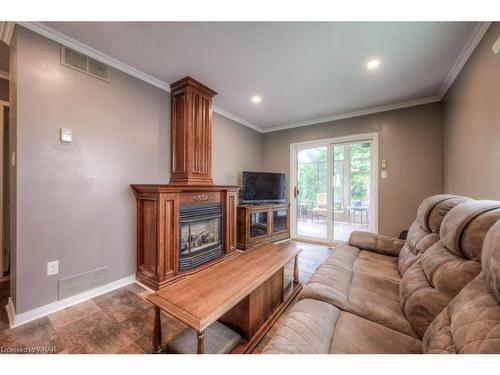 28 Peglar Crescent, Fergus, ON - Indoor Photo Showing Living Room With Fireplace