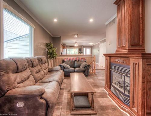 28 Peglar Crescent, Fergus, ON - Indoor Photo Showing Living Room With Fireplace