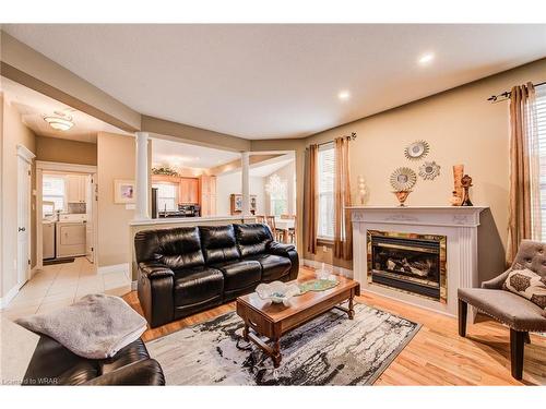 11 Coopershawk Street, Kitchener, ON - Indoor Photo Showing Living Room With Fireplace
