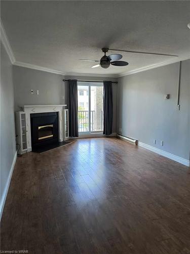 211-735 Deveron Crescent, London, ON - Indoor Photo Showing Living Room With Fireplace