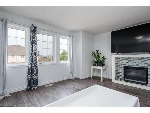 P90-175 David Bergey Drive, Kitchener, ON - Indoor Photo Showing Living Room With Fireplace