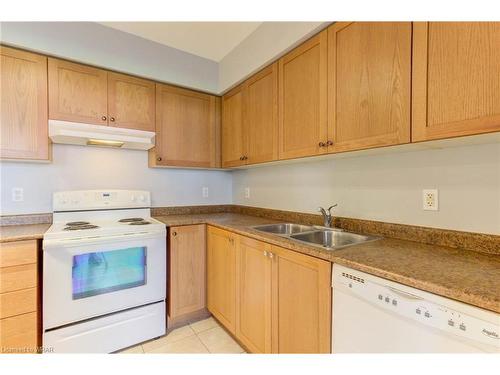 106-70 First Street, Orangeville, ON - Indoor Photo Showing Kitchen With Double Sink