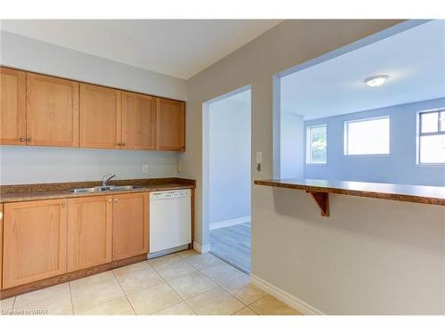 106-70 First Street, Orangeville, ON - Indoor Photo Showing Kitchen With Double Sink