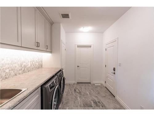 21 Hudson Drive, Brantford, ON - Indoor Photo Showing Laundry Room