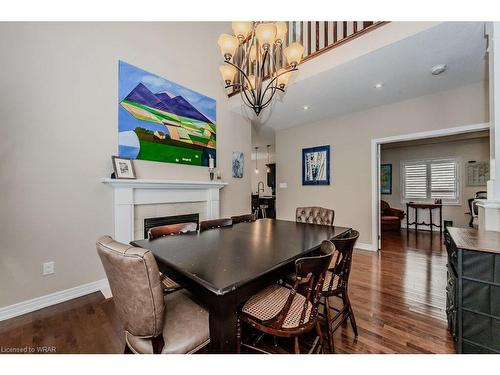 141 Redtail Street, Kitchener, ON - Indoor Photo Showing Dining Room With Fireplace