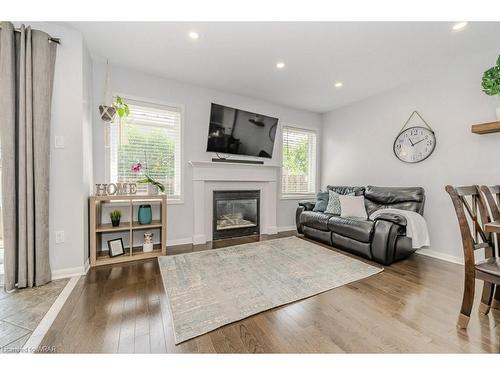 27 Blackbird Circle, Cambridge, ON - Indoor Photo Showing Living Room With Fireplace