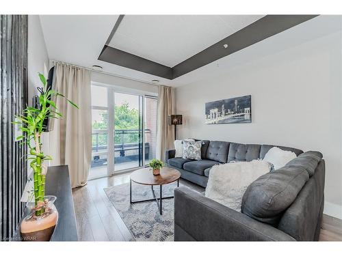 218-155 St Leger Street, Kitchener, ON - Indoor Photo Showing Living Room