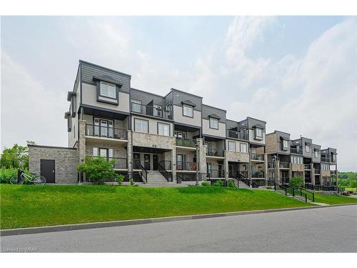 64F-1989 Ottawa Street S, Kitchener, ON - Outdoor With Balcony With Facade